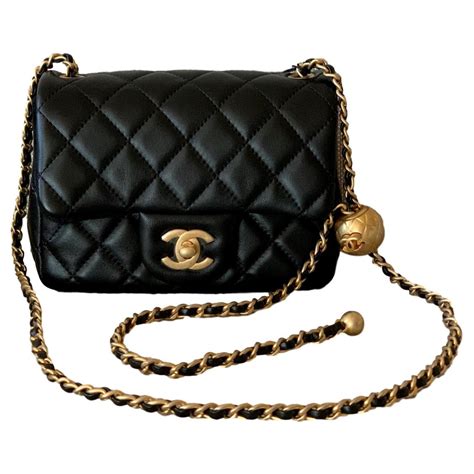 small black chanel purse with pearls|chanel mini flap bags.